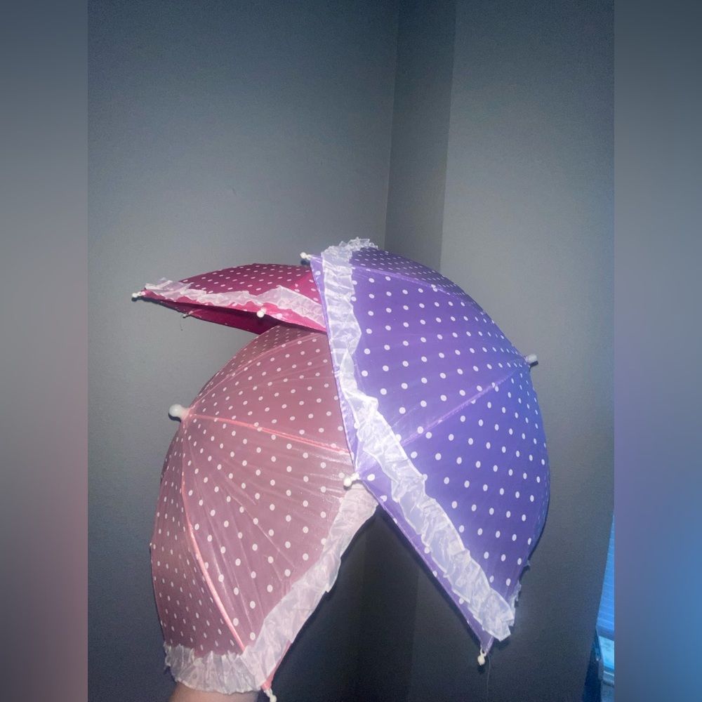 Three Polkadot Umbrellas